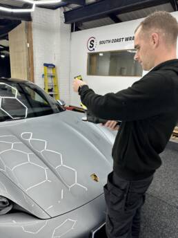 South Coast Wrapping Porsche Tycan Side and Bonnet Graphics