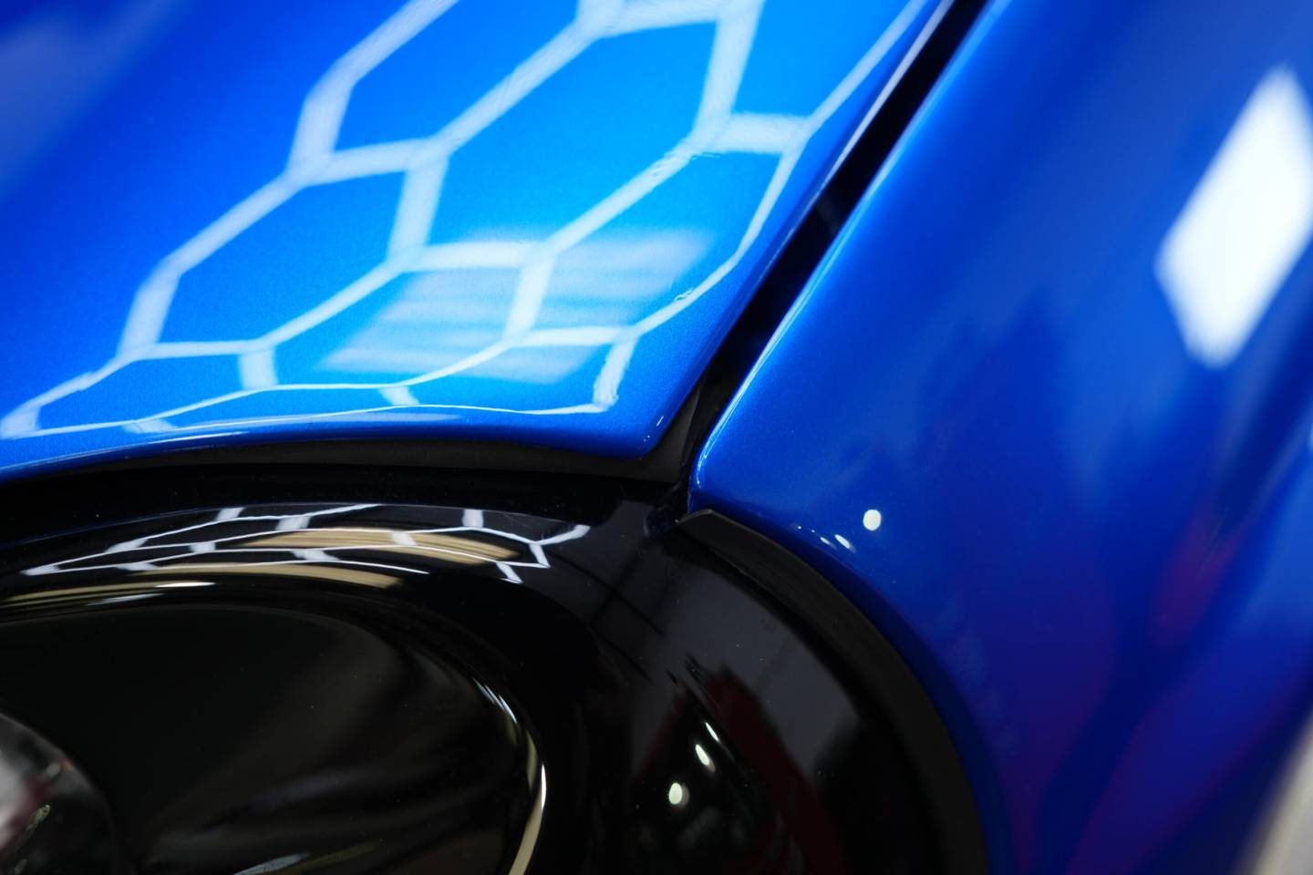 Blue Subaru Impreza bonnet and front wing panel gap