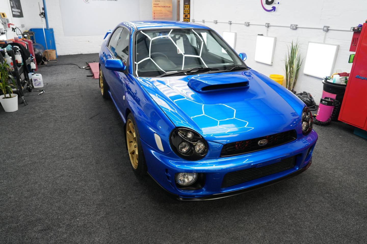 Blue Subaru Impreza in the South Coast Wrapping workshop