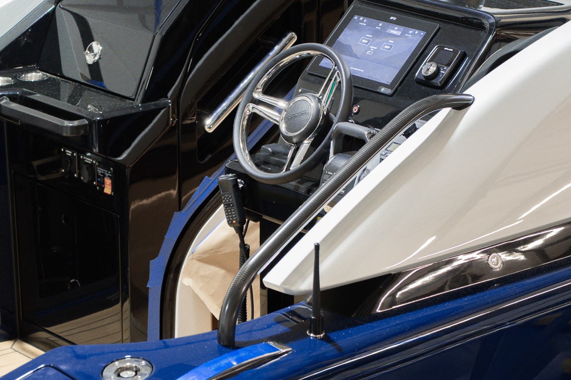 Open cockpit of a blue classic sports car