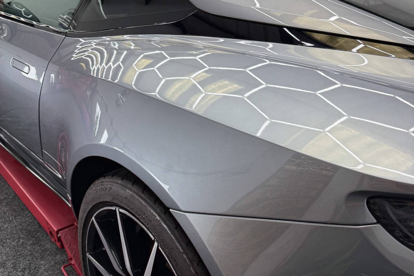 Grey sports car bonnet and windscreen