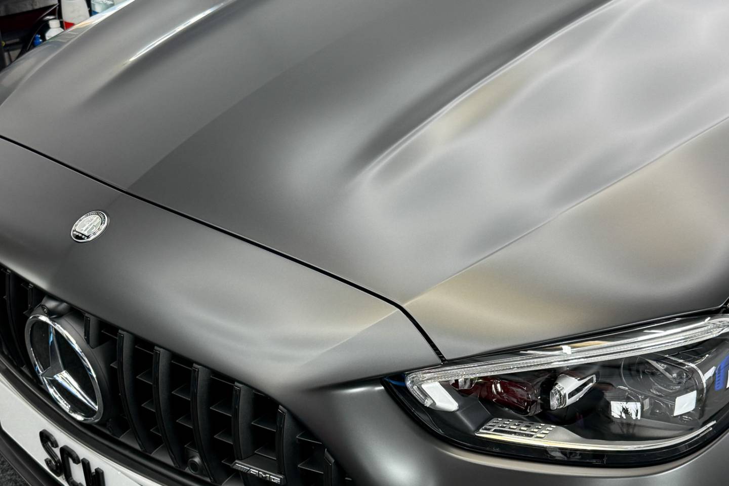 Matte paint protection film finish across a Mercedes bonnet