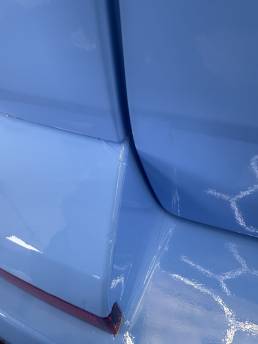 Blue lower panel and door edge on two-tone VW Transporter
