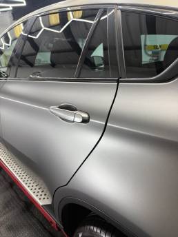 Side view of satin grey BMW X6 doors