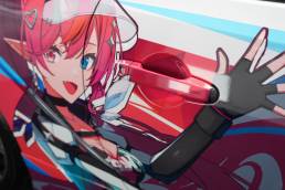 Anime character graphics around Toyota GT86 door handle