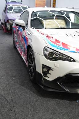 Front three-quarter view of Toyota GT86 custom anime graphics