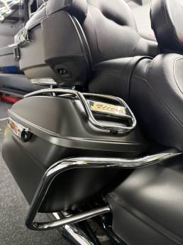 Matte black Harley-Davidson touring motorcycle pannier and seat