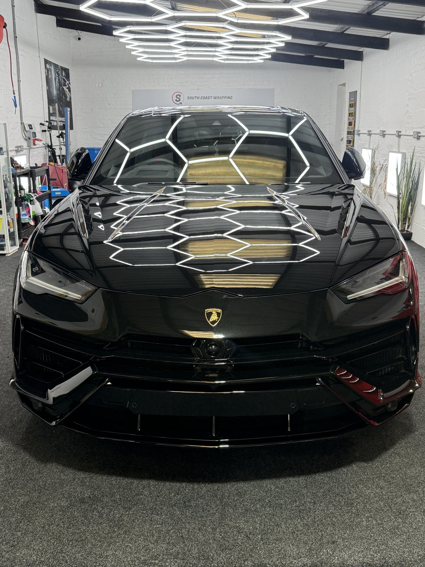 Front view of black Lamborghini Urus at South Coast Wrapping