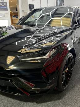 Front three-quarter view of black Lamborghini Urus