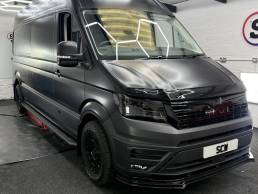 Satin grey MAN van side and front view