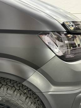 Satin grey finish around MAN van front wheel arch