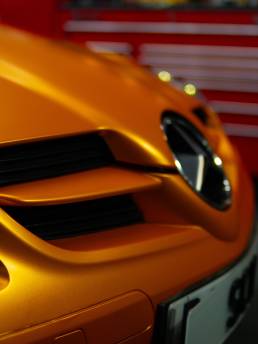 Close-up of orange Mercedes-Benz SLK front bumper
