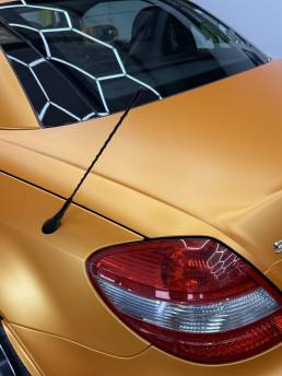 Orange finish around Mercedes-Benz SLK rear light