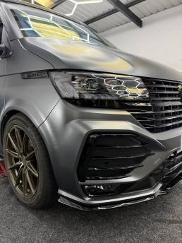 Satin grey VW Transporter front bumper and black grille