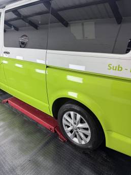 Two-tone lime green and white VW Transporter side
