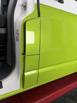 Lime green wrap around VW Transporter door opening